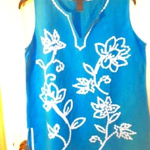 Sleeveless aqua colored embroidered white flowered front top size XL.
